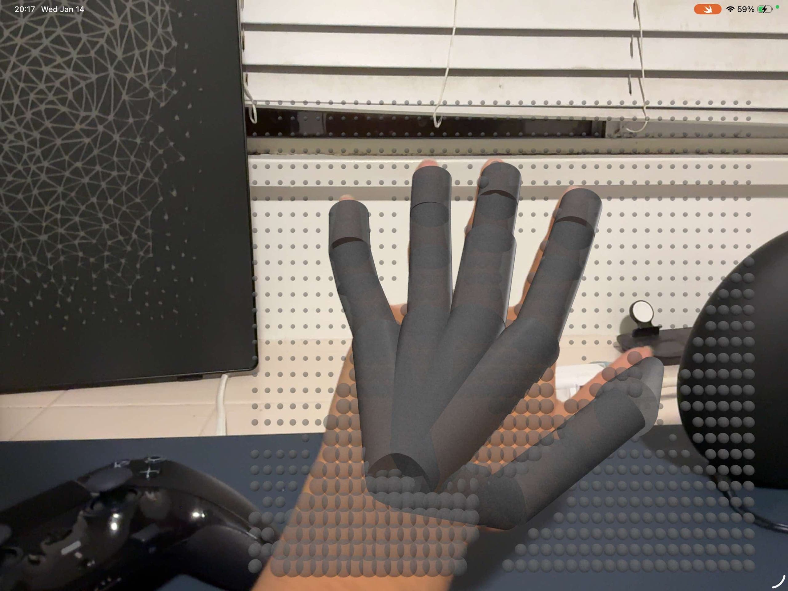 Reconstructed hand skeleton overlaid on the camera feed